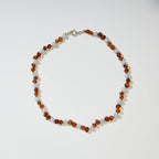 Regn Adult Necklace – Damenhalskette aus Caramel-Bernstein und blauem Aquamarin – Nirrimis