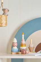 Celebrate Activity Toy – Bloomingville MINI: stacking toy on a shelf in the kids' room.