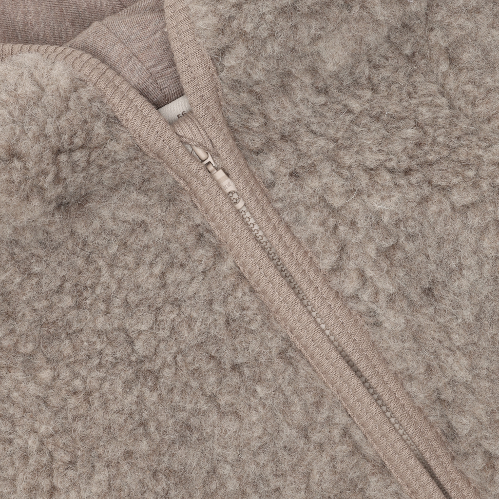 Baby buitenpak wool teddy - Camel Melange - 100% wol - HUTTEliHUT close up