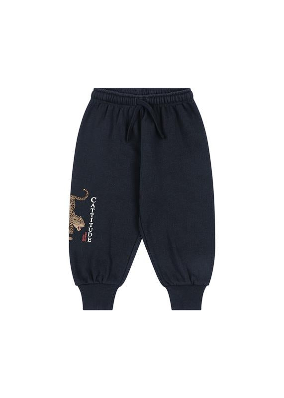 Pantalon de jogging Loupy – Navy Blue – Konges Sløjd : pantalon de jogging bleu foncé avec cordon de serrage et illustration sur la jambe.